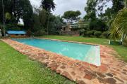 Une villa F4 de plain pied avec piscine et vue sur Masay à Ivandry